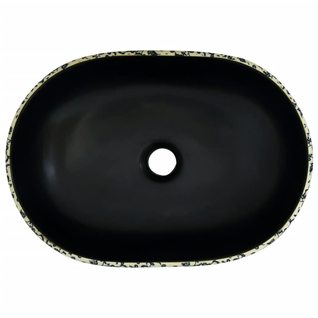 vidaXL Lavatório de bancada oval 47x33x13 cm cerâmica preto e azul