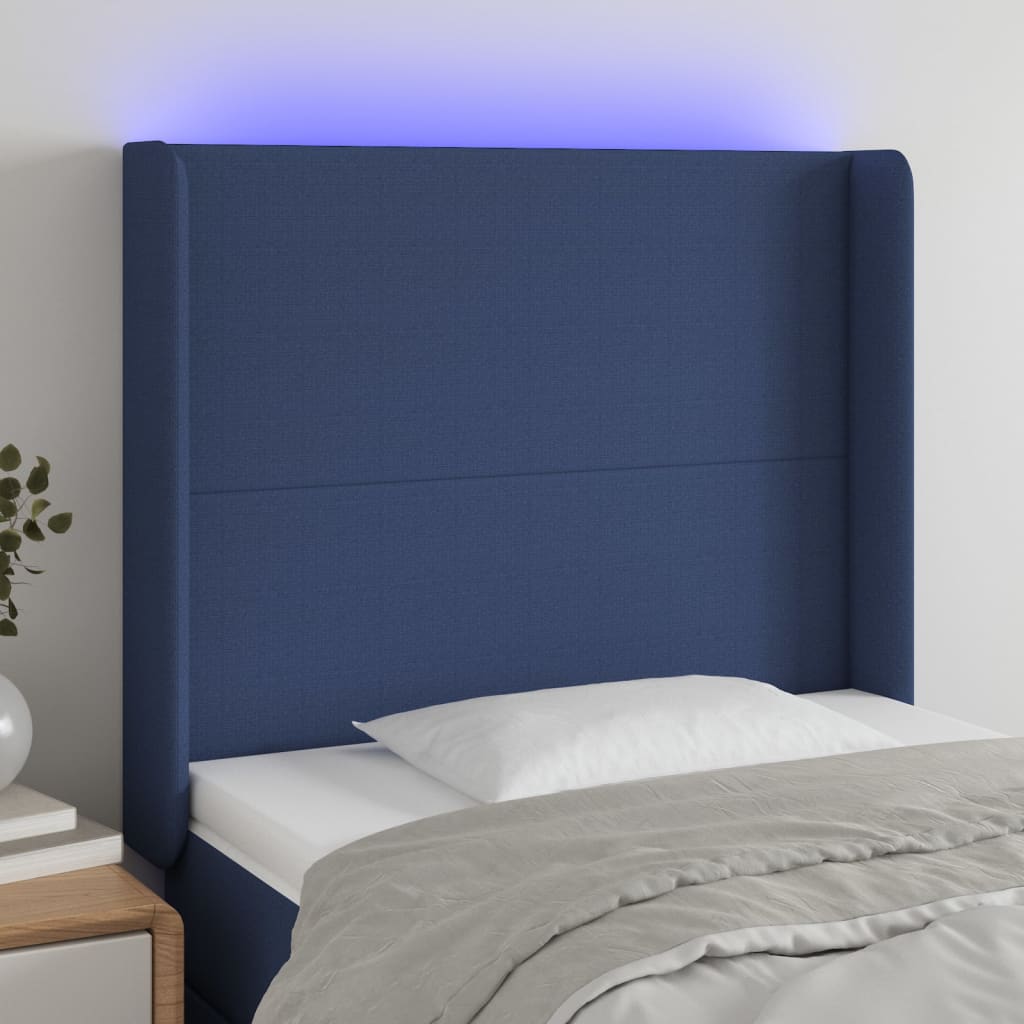 vidaXL Cabeceira de cama c/ luzes LED tecido 103x16x118/128 cm azul