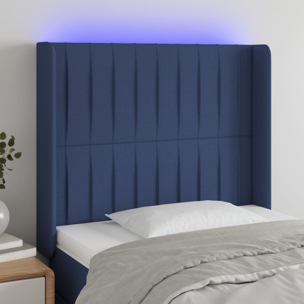 vidaXL Cabeceira de cama c/ luzes LED tecido 103x16x118/128 cm azul