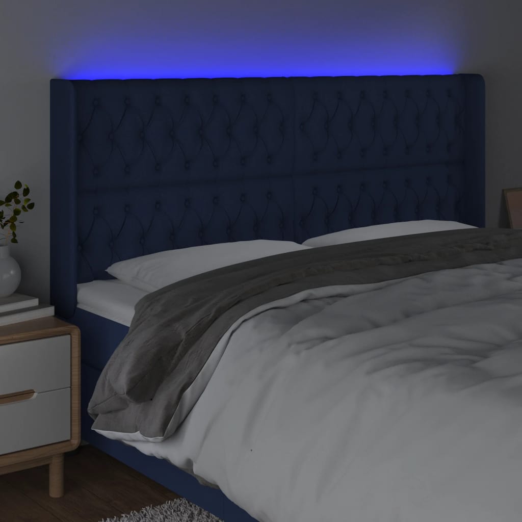 vidaXL Cabeceira de cama c/ luzes LED tecido 183x16x118/128 cm azul